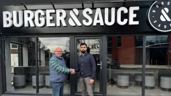 Pictured (L2R) Anthony Round, franchise director and Adil Hussain, Franchisee. Photo from Burger & Sauce.