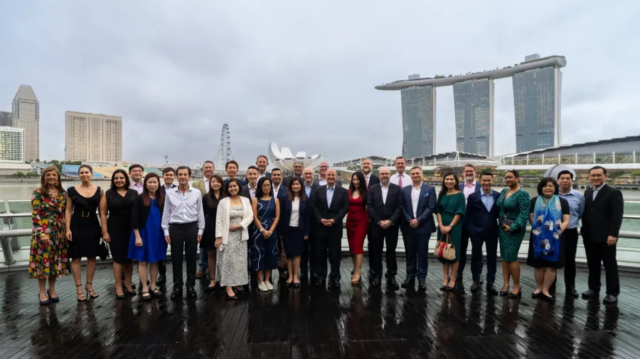 Everest senior leaders and members of the Singapore team celebrate the grand opening of the Everest Insurance Singapore® office.