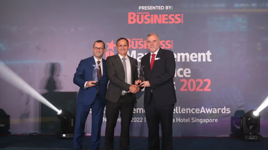 Mr Maurizio Luongo (far left), Chief Executive Officer and Mr Glen Godresse (center), Chief Marketing Officer and Head of Commercial Excellence of Menarini Asia-Pacific receive the award for Executive of the Year - Pharmaceuticals and Team of the Year - Pharmaceuticals respectively at the SBR Management Excellence Awards 2022.