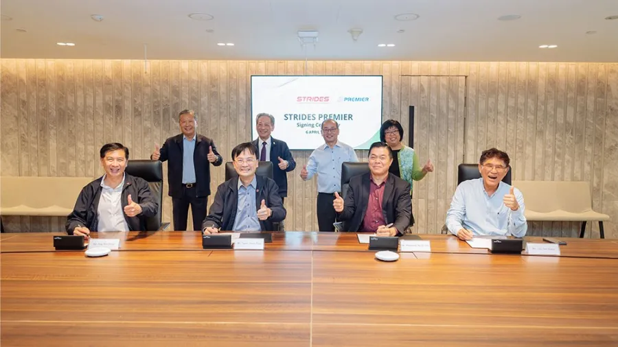 Representatives of Strides Taxi and Premier Taxis witnessed the signing of the merger (Photo from Strides Mobility)
