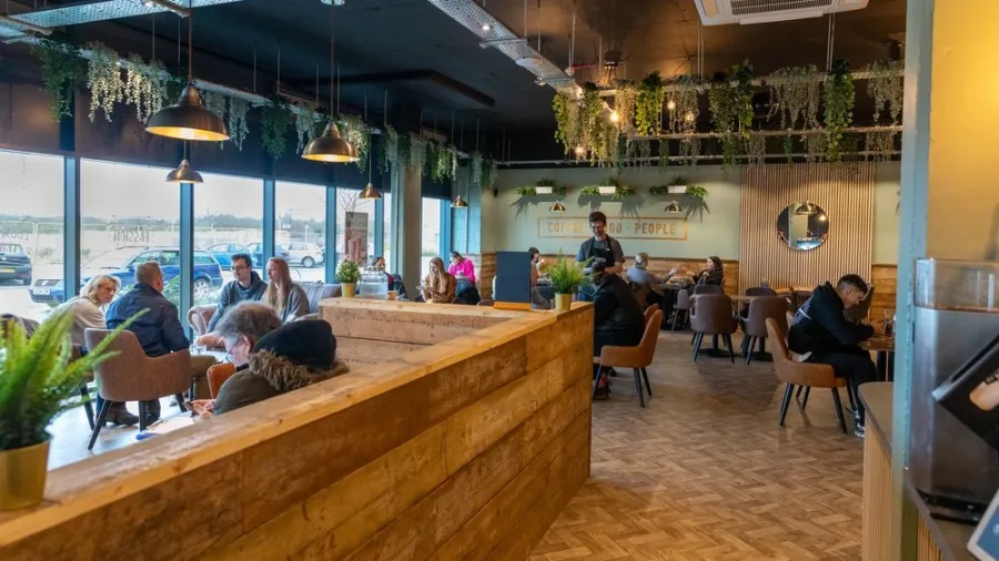 Press photo. /Cooks Coffee Company